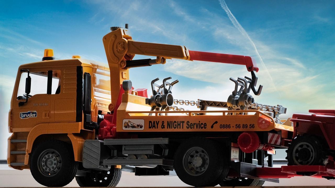 Flatbed service truck dispatched to a job